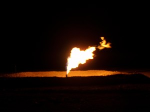 Gas flaring on Bakken oil field, North Dakota. Photo via Wikimedia Commons